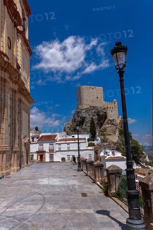 White village with La Encarnacion church on the Moorish hill, Olvera, Andalusia, Spain