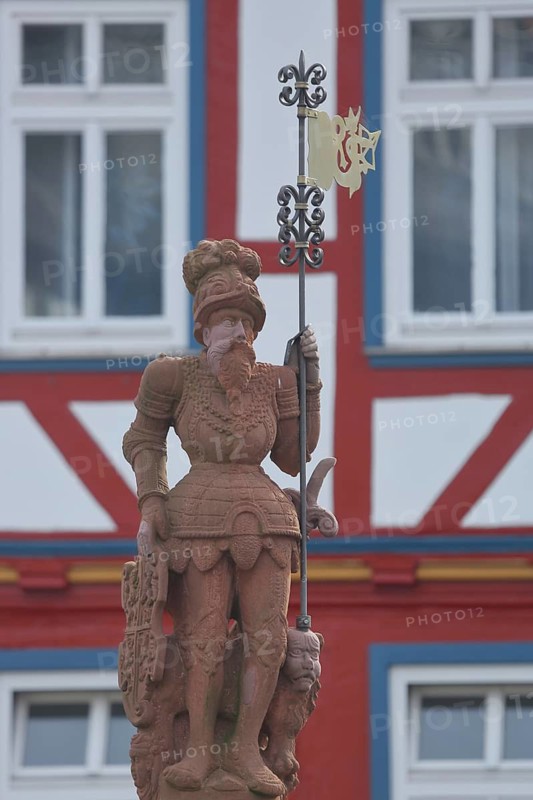 Figure with lance at the market fountain, sculpture, market square, Butzbach, Wetterau, Hesse, Germany