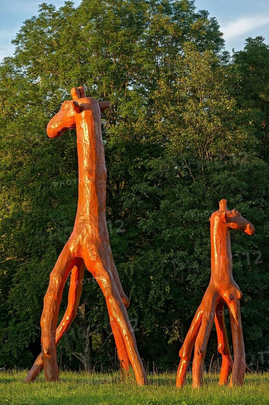 Giraffes made of red painted tree trunks, wooden sculpture by Günter Schumann, Museum of the Imagination by Lothar-Günther Buchheim, Bernried am Starnberger See, Upper Bavaria, Bavaria, Germany