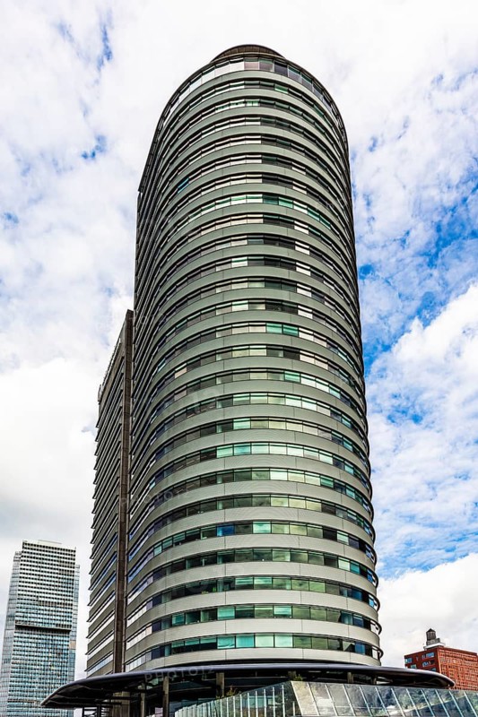World Port Center, a distinctive skyscraper on Wilhelminapier in the harbor, by British architect Norman Foster, modern architecture in the city panorama, Rotterdam, the Netherlands