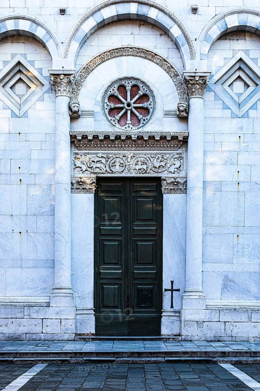 Entrance portal of the church of San Michele in Foro, historic city centre, Lucca, Tuscany, Italy