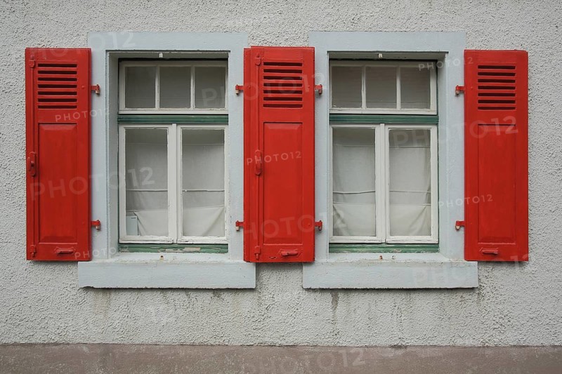 House façade with two windows and three red shutters, white, Kronberg, Taunus, Hesse, Germany