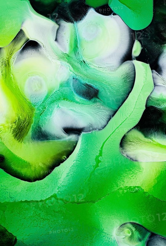 Vivid green liquids art with swirling patterns and dynamic textures. This abstract piece features gradients and intricate forms, perfect for creative projects or backgrounds