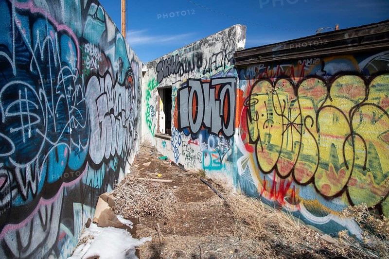 Twin Arrows, Arizona - The ruins of the Twin Arrows Trading Post, which closed in 1995. The building are now covered with graffiti, and one of the two arrows has fallen