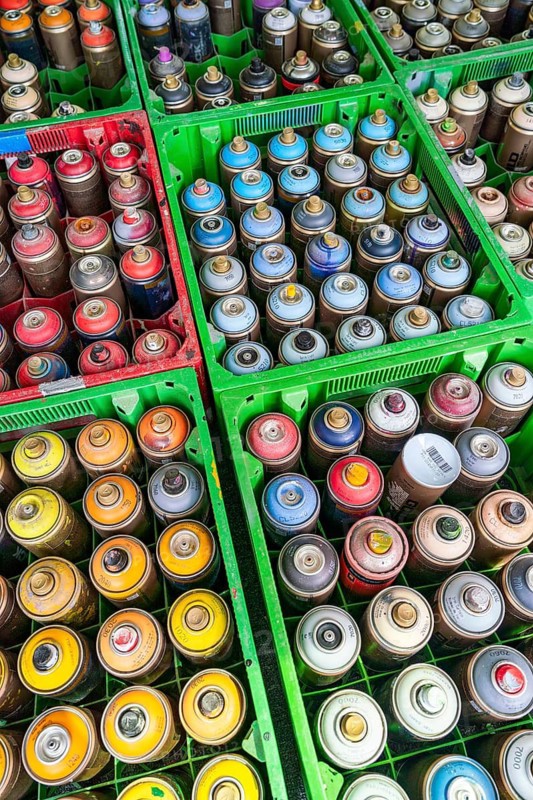Boxes of paint cans for spraying a graffiti artist in Schwedt an der Oder, Uckermark, Brandenburg, Germany