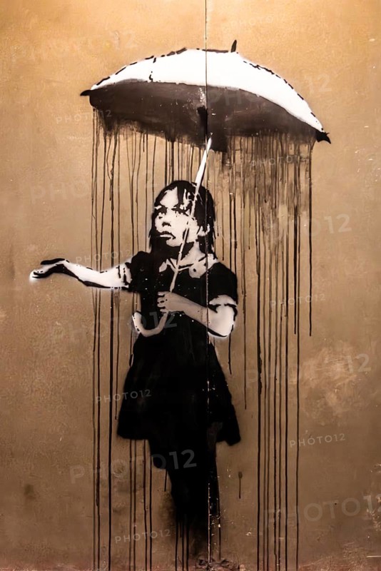 Banksy - Nola, Umbrella Girl, indictment of systemic failure in times of crisis, 2008, New Orleans, USA, exhibition The World of Banksy
