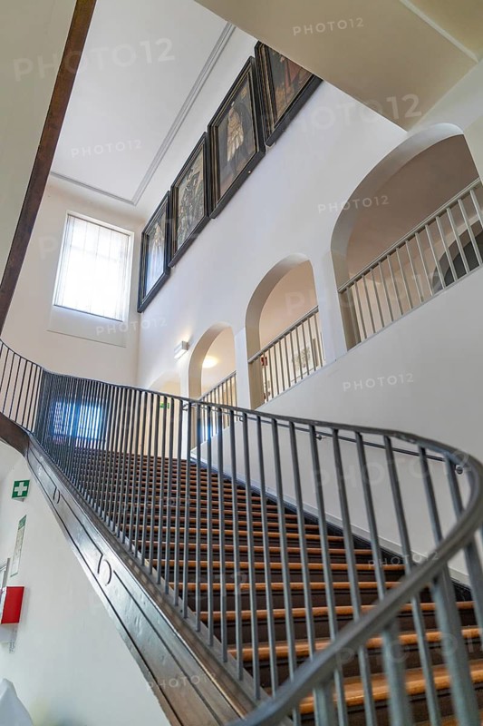 Classic staircase in a building, decorated with framed works of art, Kirchheim Teck, Germany