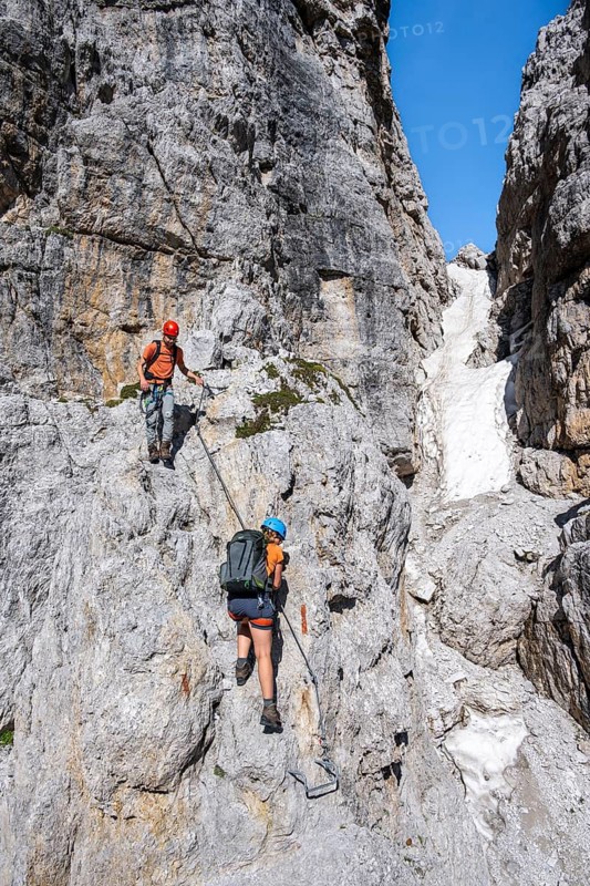 Mountaineers on the Bocchette Centrale band trail, via ferrata in the Brenta Mountains, Brenta-Adamello Natural Park, Trentino, Italy