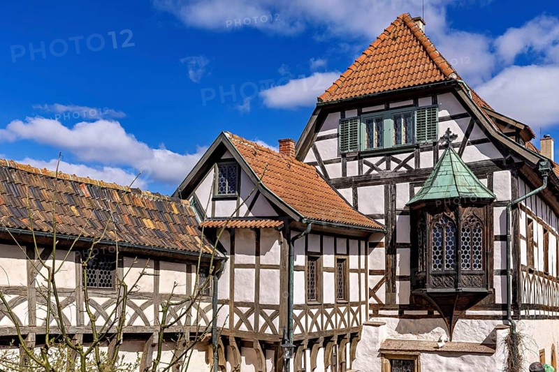 Traditional half-timbered houses under a clear blue sky, Wartburg Castle near Eisenach in Thuringia