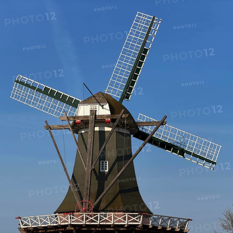 Meyer Mühle or Meyers Mühle with millstone fountain on the main canal, Papenburg, Emsland, Lower Saxony, Germany