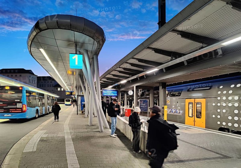 Bus station in the early morning right next to Wuppertal main station, public transport connection, North Rhine-Westphalia, Germany