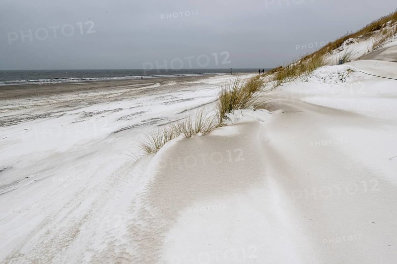 Snow-covered dunes on the North Sea beach, Langeoog, Lower Saxony, Germany