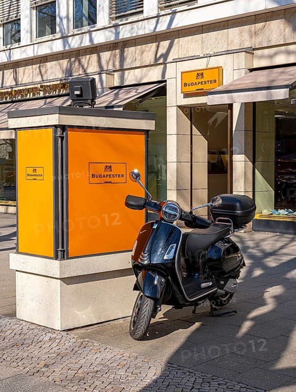 The typical and partly historic display cases for advertising along Boulevard Kurfürstendamm, Berlin, Germany