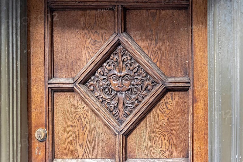 Door decorated with carvings, Brasenose College, Oxford, England, Great Britain