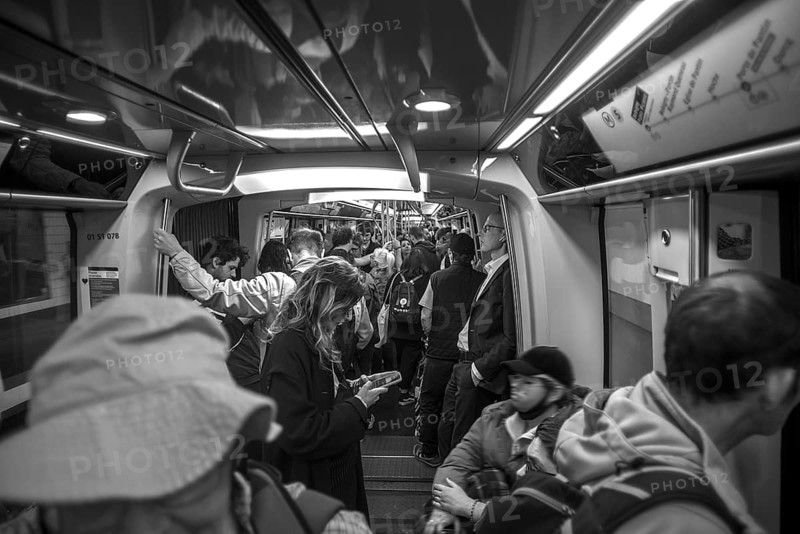 Metro fully staffed at rush hour, black and white, Paris France