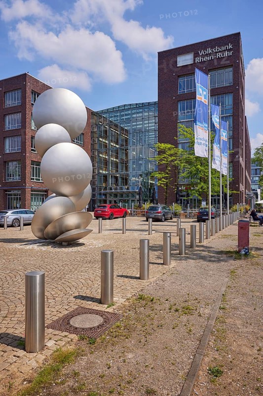 Sculpture Cultivator 4 by Thomas Schönauer made of glass-blasted stainless steel in front of the Volksbank Rhein-Ruhr headquarters at the inner harbour in Duisburg, Ruhr area, independent city, North Rhine-Westphalia, Germany