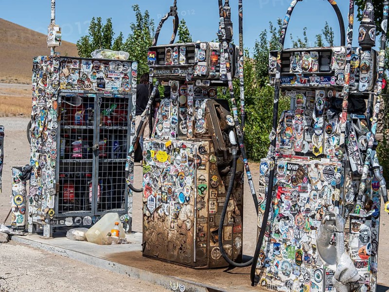 Fuel pump covered with stickers, gas station Baja Caracoles, at ruta nacional 40, Argentina