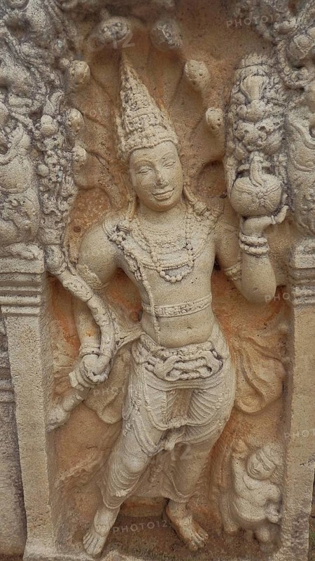 Stone relief, watchstone, muragala of an ancient figure, richly decorated and traditionally depicted in a historical context, Ratnaprasada, Anuradhapura, Sri Lanka