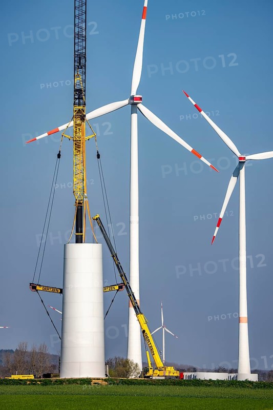 Construction site of the new Bedburg 3 wind farm, on recultivated open-cast mining site, 9 wind power plants with an output of 60 megawatts are being built, installation of the wind turbine tower operated by RWE and the city of Bedburg, North Rhine-Westphalia, Germany