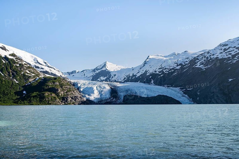 Snowy mountains and glaciers Portage Glacier on Portage Lake glacial lake, Chugach National Forest, Alaska, USA