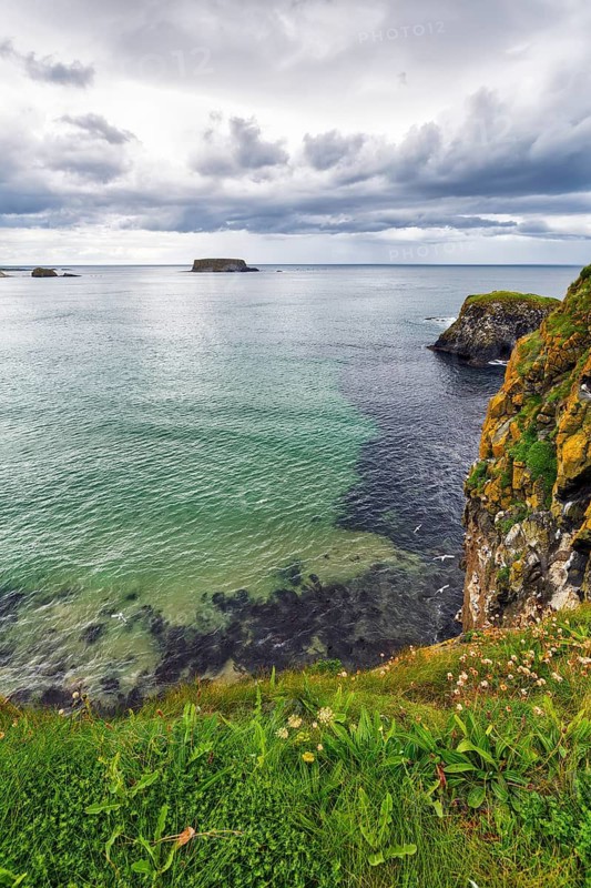 Coastline between Ballycastle and Ballintoy with a view of the sea, cliffs, Causeway Coastal Route, Antrim, Northern Ireland, Great Britain