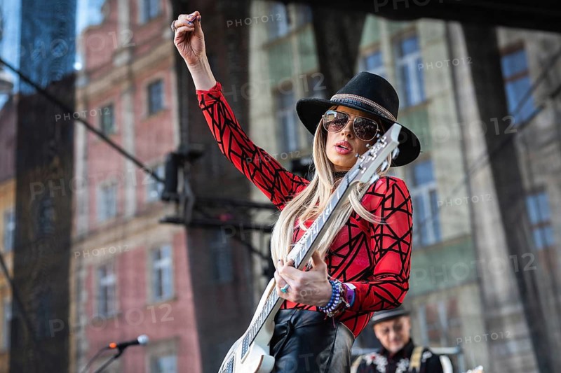 WROCLAW, POLAND - MAY 1, 2025: World Guitar Record concert, 8122 participants played Jimi Hendrix's song Hey Joe on guitars in the Wroclaw market square. Woman guitarist Orianthi