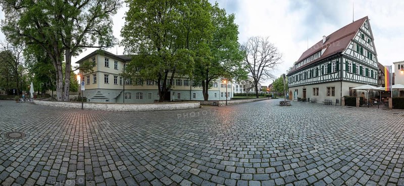 April 19, 2026: Panoramic view of Schlossplatz with Kirchheim Castle and Old Forestry House at early morning. Kirchheim unter Teck, Baden Württemberg, Germany