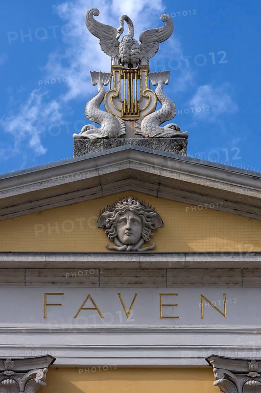 Figures on the roof of the city theatre, swan, lyre and fish, Bismarckplatz, Regensburg, Upper Palatinate, Bavaria, Germany