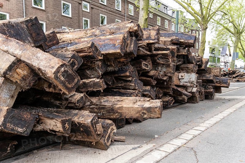 Construction site of a tram line, tracks and railway sleepers are being replaced and lie stacked on the road, Düsseldorf, Germany