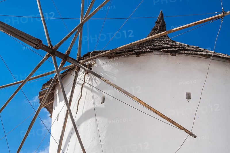 Majestic Windmill on Santorini Greece Against Deep Blue Sky