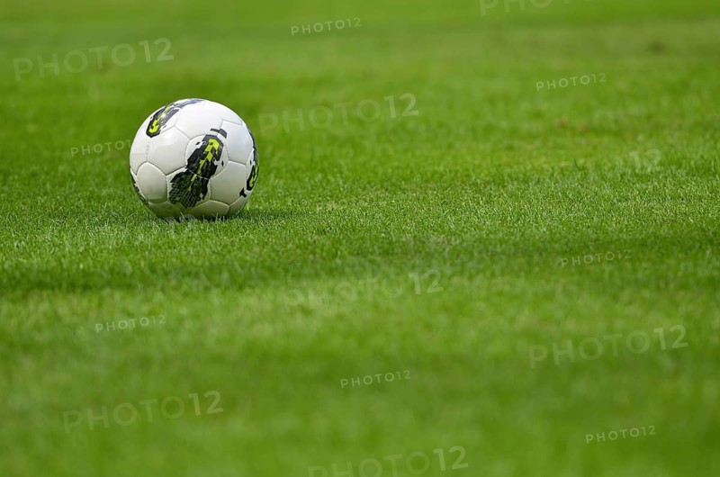 Football ball on the grass in Lubin, Poland