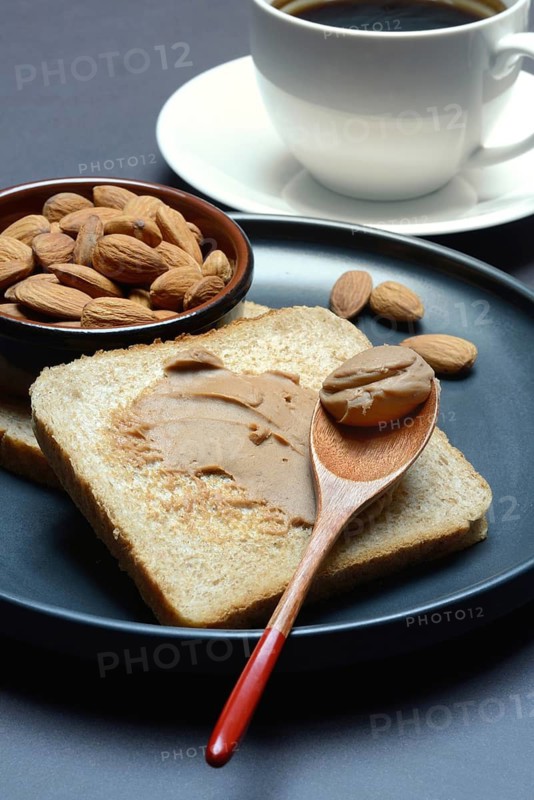 Toast with almond cream and almond shell, spread