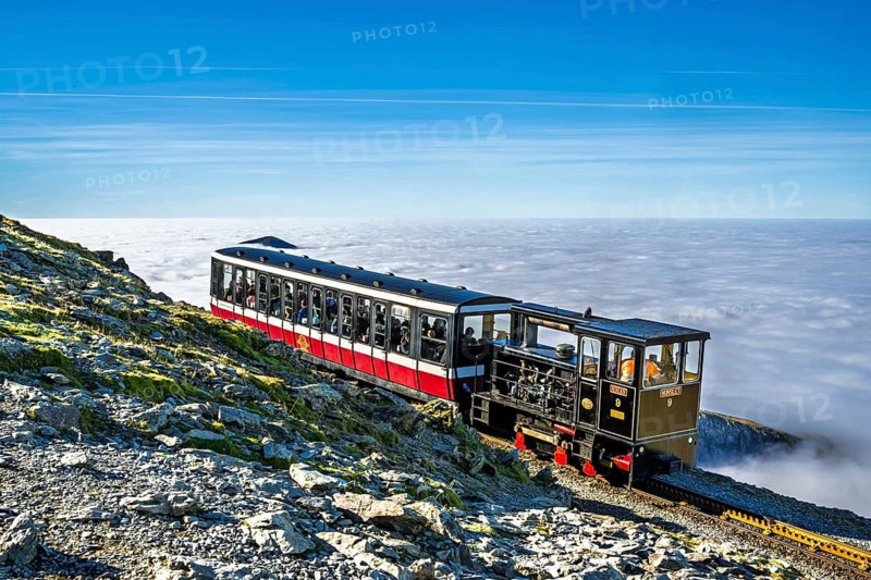 Train on Snowdon Massif, Snowdon Range, Snowdonia, North Wales, UK