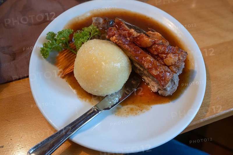 Schäuferle, pork shoulder with dumpling and sauce, served in an inn, specialty in Fanken, Bavaria, Germany