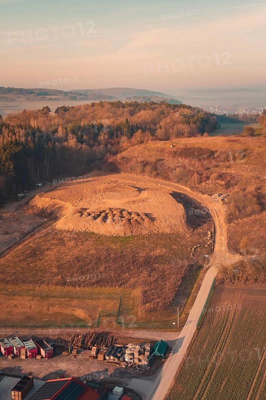 Landscape with a large hill surrounded by trees and fields at dawn, landfill, Gechingen, Calw district, Germany