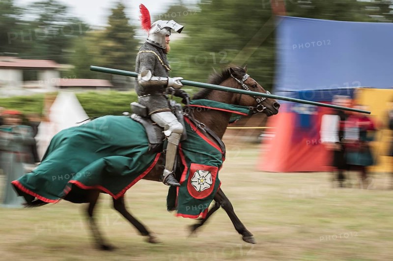 LUBIAZ, POLAND - AUGUST 25, 2018: Monastery Siege - historical staging. Knights horse riding show