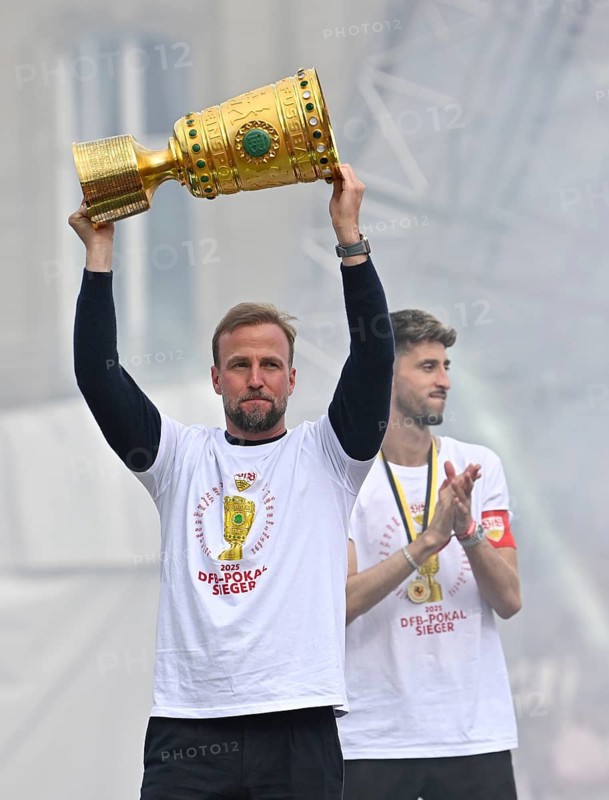 Coach Sebastian Hoeneß VfB Stuttgart captain Atakan Karazor VfB Stuttgart (16) with trophy, jubilation joy emotion VfB Stuttgart victory celebration, VfB Stuttgart team celebrates winning the DFB Cup 2025 in Stuttgart at Schlossplatz, Stuttgart, Baden-Württemberg, Germany