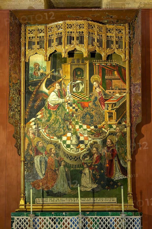 Richly detailed medieval religious painting with several saints and ornate details, Cathedral Mosque of Cordoba (Mezquita-Catedral), Cordoba, Andalusia, Spain