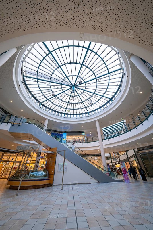 Interior of a shopping centre with a large glass roof and modern architecture, Sterncenter Sindelfingen, Böblingen district, Germany
