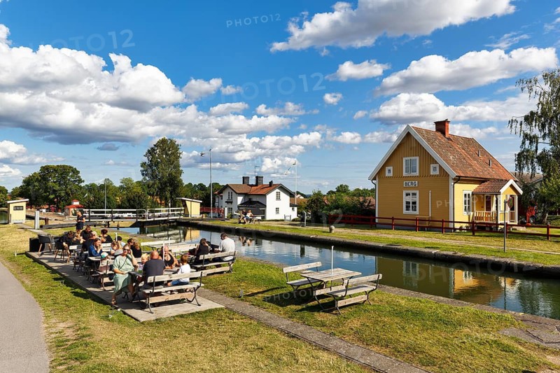Many tourists in the tourist restaurant, Schleusentreppe bei Berg, Cumulus, Göta Canal, Östergötland, Sweden