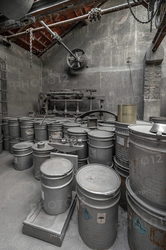 Metal barrels covered with zinc dust in the filling and weighing room for zinc powder of a metal powder mill, founded in 1900, Igensdorf, Upper Franconia, Bavaria, Germany