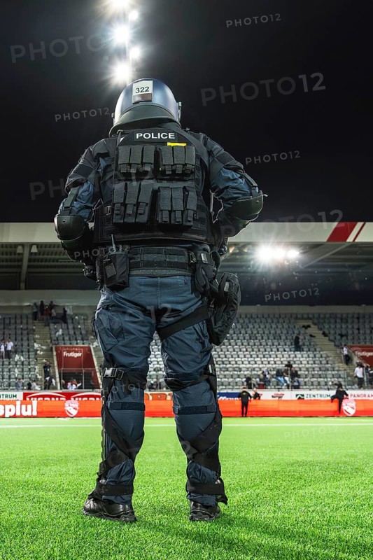 Police officer in combat gear Football stadium