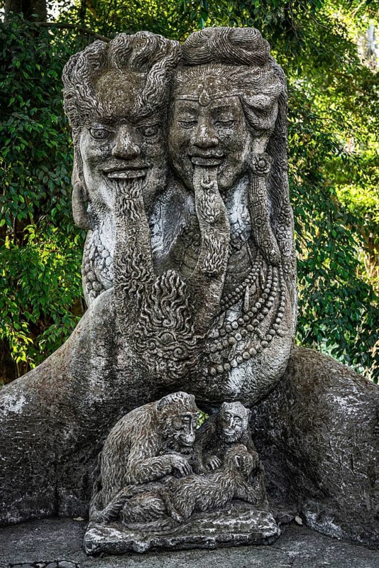 Temple figure as couple with monkey, woman, man, animal, Hinduism, tongue, long, sticking out, facial expression, stone, stone figure, temple, religion, world religion, god, grimace, sculpture, art, culture, figure, deity, icon, decoration, believing, faith, sculpture, fantasy, art figure, pray, representation, religious, journey, spirituality, traditional, meditation, mythology, sacred, asian, abstract, wisdom, image, depiction, decorated, tradition, sacred monkey forest, Bali, Indonesia