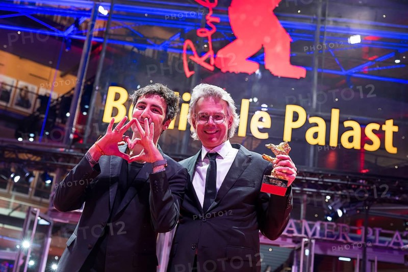 Ilker Çatak (director) and Ingo Fliesson (producer) pose with the Golden Bear for Best Film Arctia flavia (Yellow Letters) after the award ceremony at the closing gala of the Berlinale at the Theater am Potsdamer Platz in Berlin on 21.02.2026. The 76th Berlin International Film Festival will take place from 12 to 22 February 2026