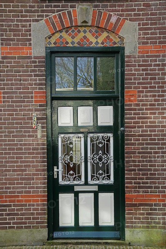Black front door with window, brick house, Den Burg, Texel, North Holland, Holland, Netherlands