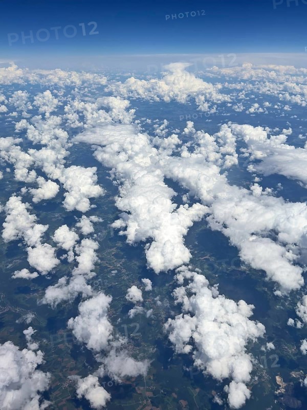 Aerial view View from high altitude 35000 feet around 10700 metres 11 kilometres from above on clouds Cirrocumulus Cluster clouds, international