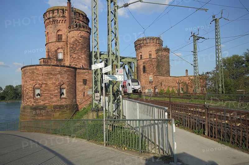 Bicycle path and tracks, train traffic, railroad, bridge pillars, towers, south bridge across the Rhine, Mainz, Rhineland-Palatinate, Germany