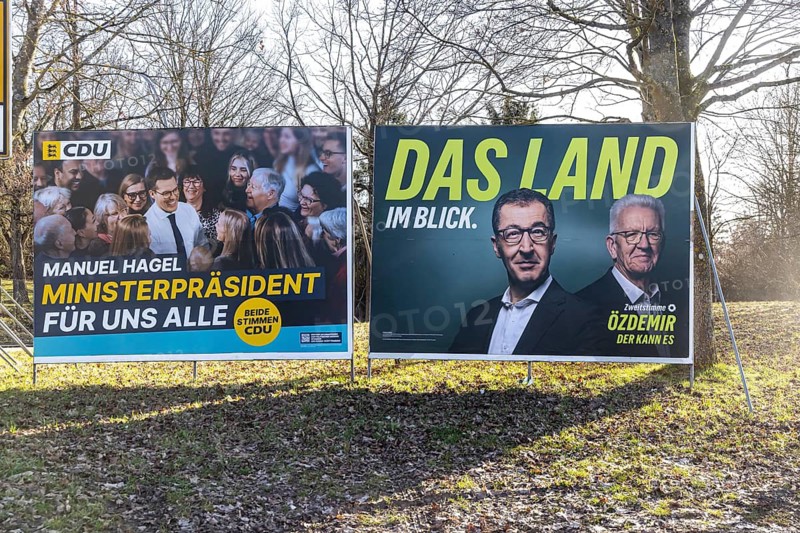 2026 state election in Baden-Württemberg. Election advertising in Fellbach near Stuttgart. Large posters of the CDU and Greens parties. Manuel Hagel and Cem Özdemir side by side. Fellbach, Baden-Württemberg, Germany