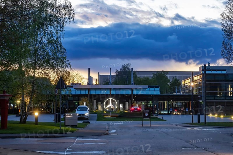Merecedes Sindelfingen plant. Mercedes-Benz Center of Excellence, Customer Centre. Mercedes star and new car. Evening atmosphere with dramatic clouds. Sindelfingen, Baden-Württemberg, Germany