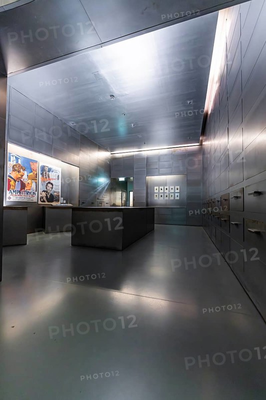 Futuristic exhibition space with metal walls, cool colours and neon lighting presenting works of art, German Kinematik, Berlin, Germany